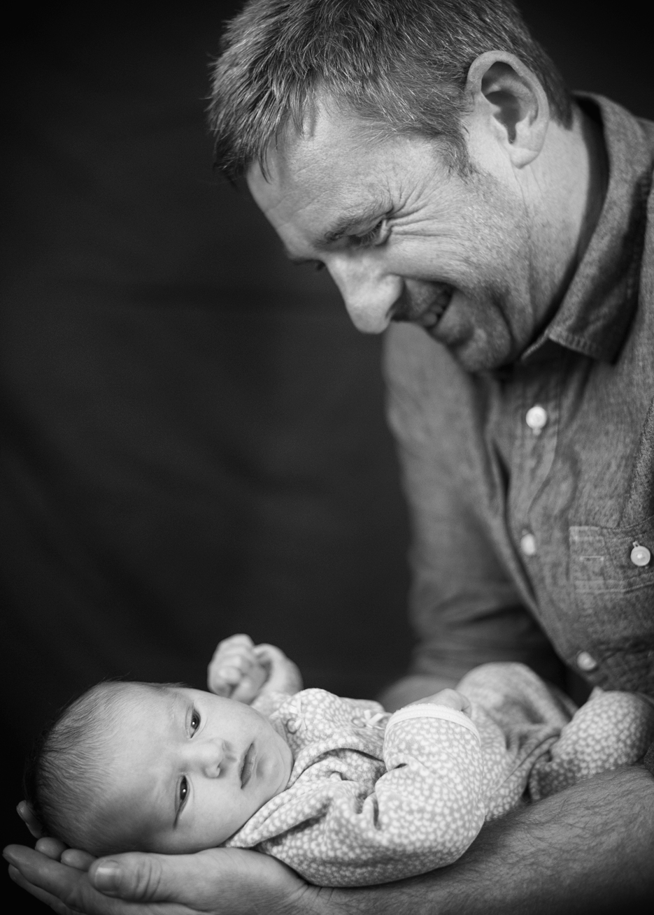 Loving Father and Newborn Daughter